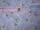 Patchworkstoff grau blau meliert mit Blumen