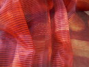 Organzastoff transparent in terra rot Tönen