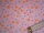 Baumwollstoff rosa mit Blumen in orange und hellblau