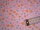 Baumwollstoff rosa mit Blumen in orange und hellblau